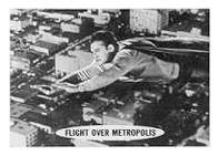 Superman trading cards. Superman flying over Metropolis.